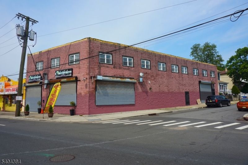 Attached, Exterior, Facade, Brick Facade, Condo Building