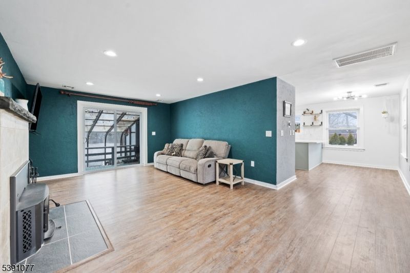 Chandelier, Fireplace, Interior, Recessed Lighting, Wood Texture Flooring