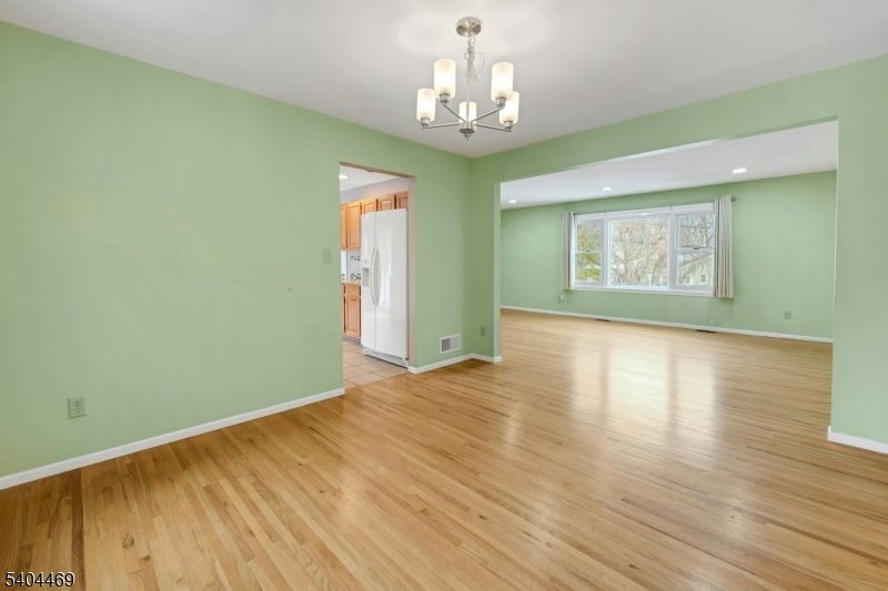 Chandelier, Empty room, Interior, Recessed Lighting, Wood Texture Flooring