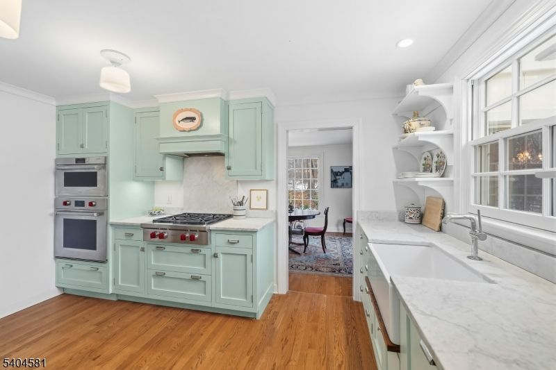 Dining room, Interior, Kitchen, Recessed Lighting, Stainless Steel Appliances, Wood Texture Flooring
