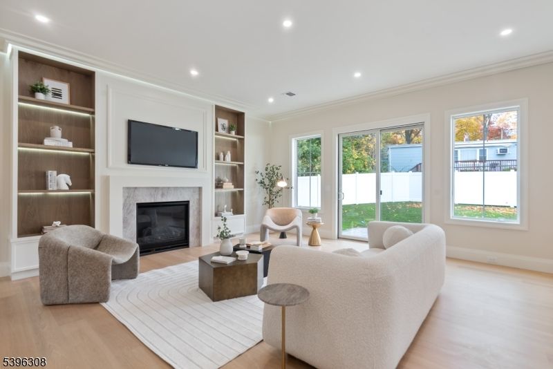 Fireplace, Interior, Living room, Recessed Lighting, Wood Texture Flooring