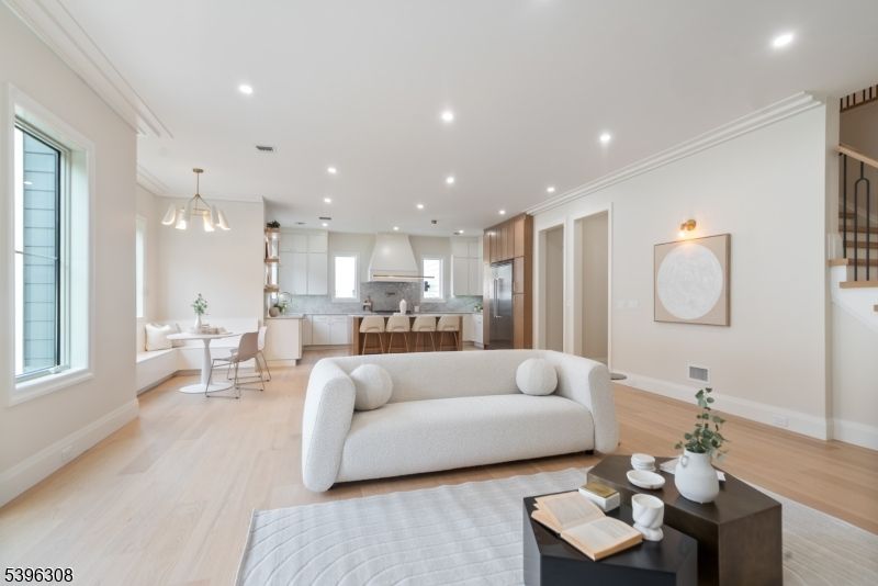 Dining room, Interior, Kitchen, Living room, Pendant Lights, Recessed Lighting, Stainless Steel Appliances, Wood Texture Flooring