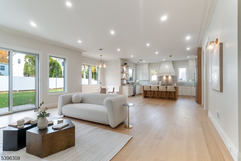 Dining room, Interior, Kitchen, Living room, Pendant Lights, Recessed Lighting, Stainless Steel Appliances, Wood Texture Flooring