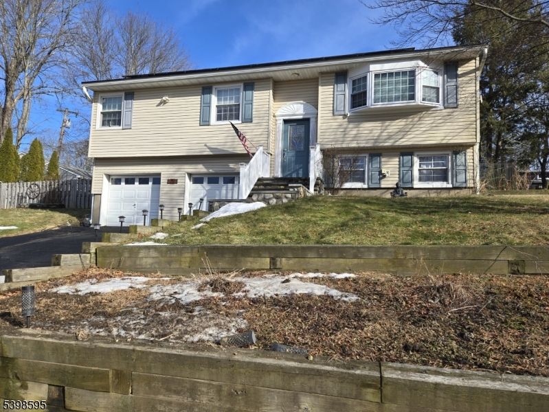 Attached, Exterior, Facade, Raised Ranch