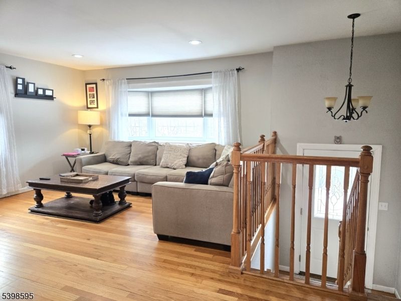 Chandelier, Interior, Living room, Recessed Lighting, Wood Texture Flooring