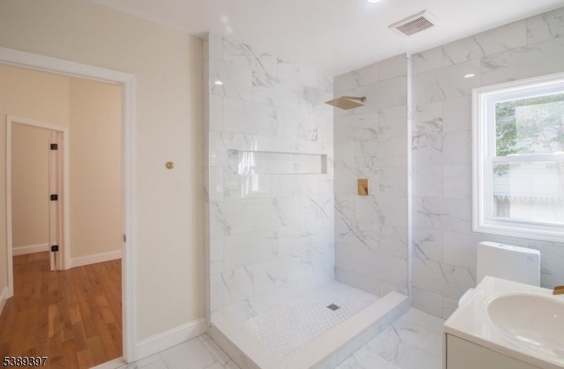 Bathroom, Glass Shower, Interior, Marble, Marble Walls, Recessed Lighting, Wood Texture Flooring