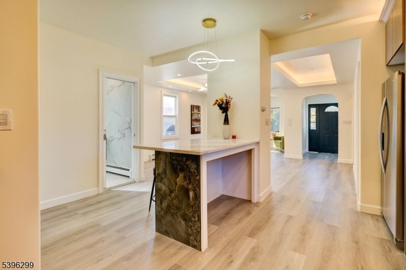 Interior, Marble Walls, Pendant Lights, Recessed Lighting, Wood Texture Flooring