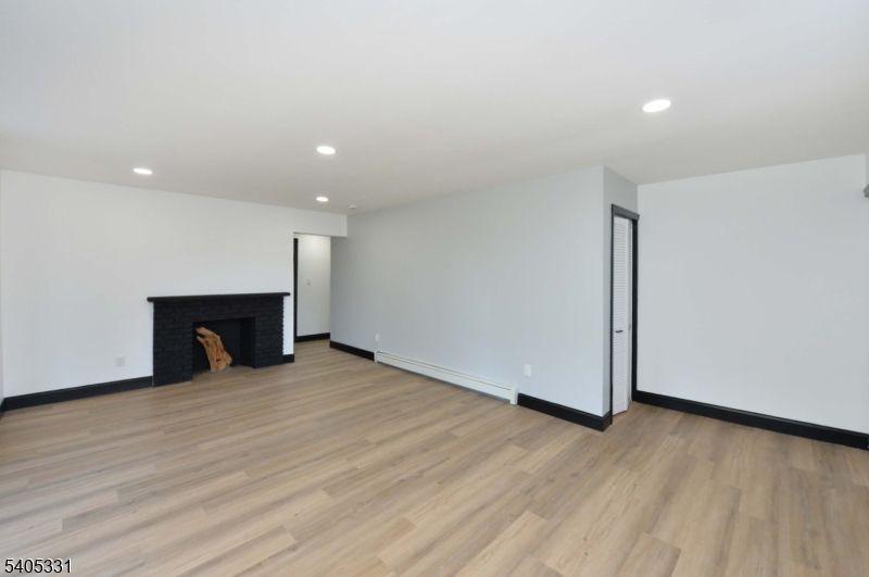 Empty room, Fireplace, Interior, Recessed Lighting, Wood Texture Flooring