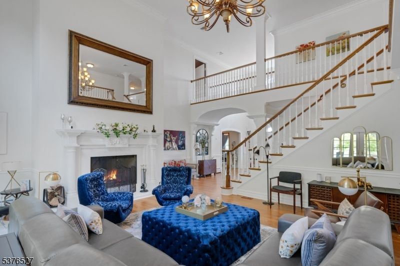 Chandelier, Fireplace, Interior, Living room, Recessed Lighting, Wood Texture Flooring