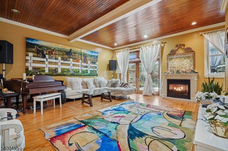 Fireplace, Interior, Living room, Piano, Recessed Lighting, Wooden Ceilings, Wood Texture Flooring