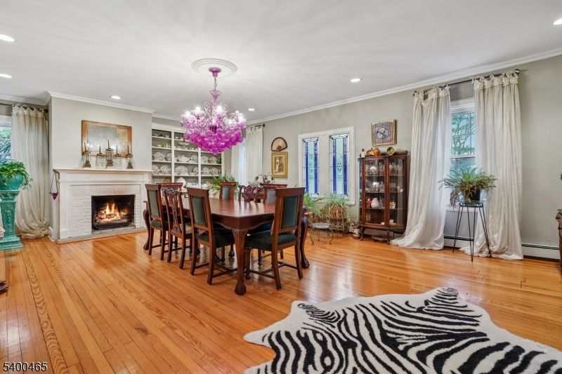 Chandelier, Dining room, Fireplace, Interior, Recessed Lighting, Wood Texture Flooring