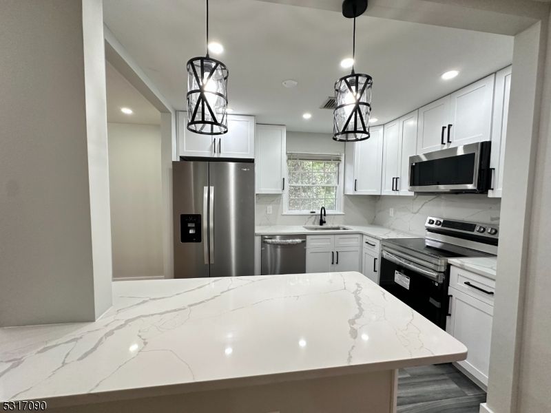 Interior, Kitchen, Pendant Lights, Recessed Lighting, Stainless Steel Appliances, Wood Texture Flooring