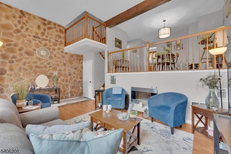 Fireplace, Interior, Living room, Pendant Lights, Stone Walls, Wooden Beams, Wood Texture Flooring