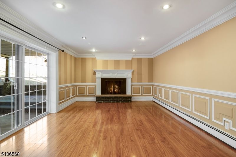 Empty room, Fireplace, Interior, Recessed Lighting, Wood Texture Flooring