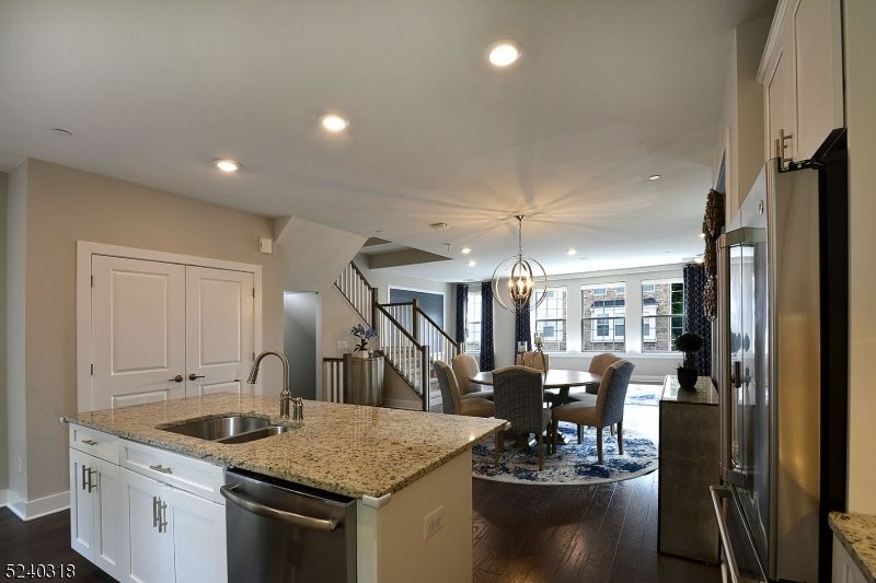 Chandelier, Dining room, Interior, Kitchen, Recessed Lighting, Stainless Steel Appliances, Wood Texture Flooring