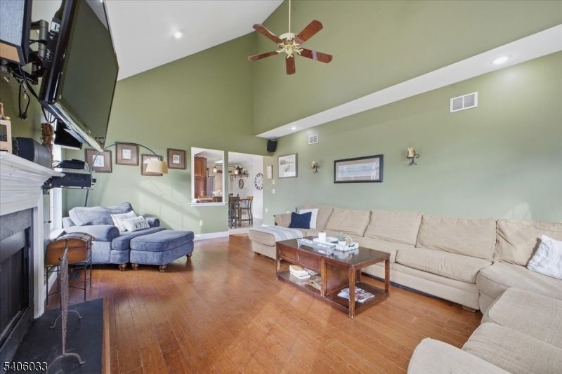 Fireplace, Interior, Living room, Recessed Lighting, Wood Texture Flooring