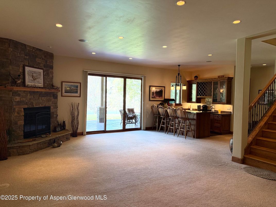 Fireplace, Interior, Kitchen, Pendant Lights, Recessed Lighting, Stone Walls