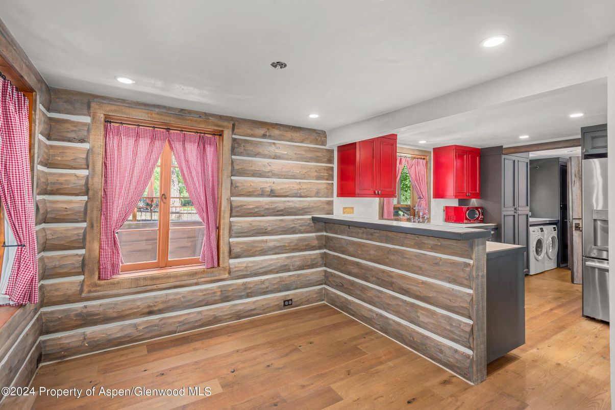 Interior, Recessed Lighting, Washer, Wood Texture Flooring, Wooden Walls
