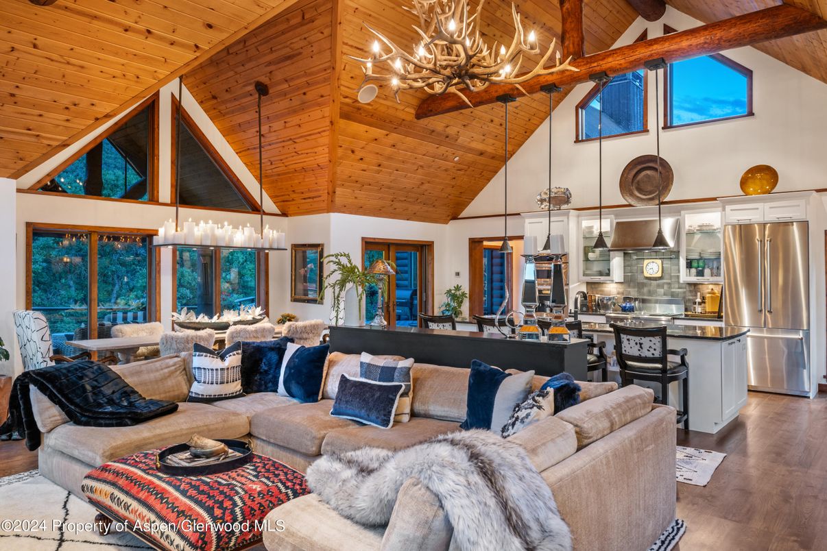 Chandelier, Dining room, Interior, Kitchen, Living room, Pendant Lights, Stainless Steel Appliances, Wooden Beams, Wooden Ceilings, Wood Texture Flooring