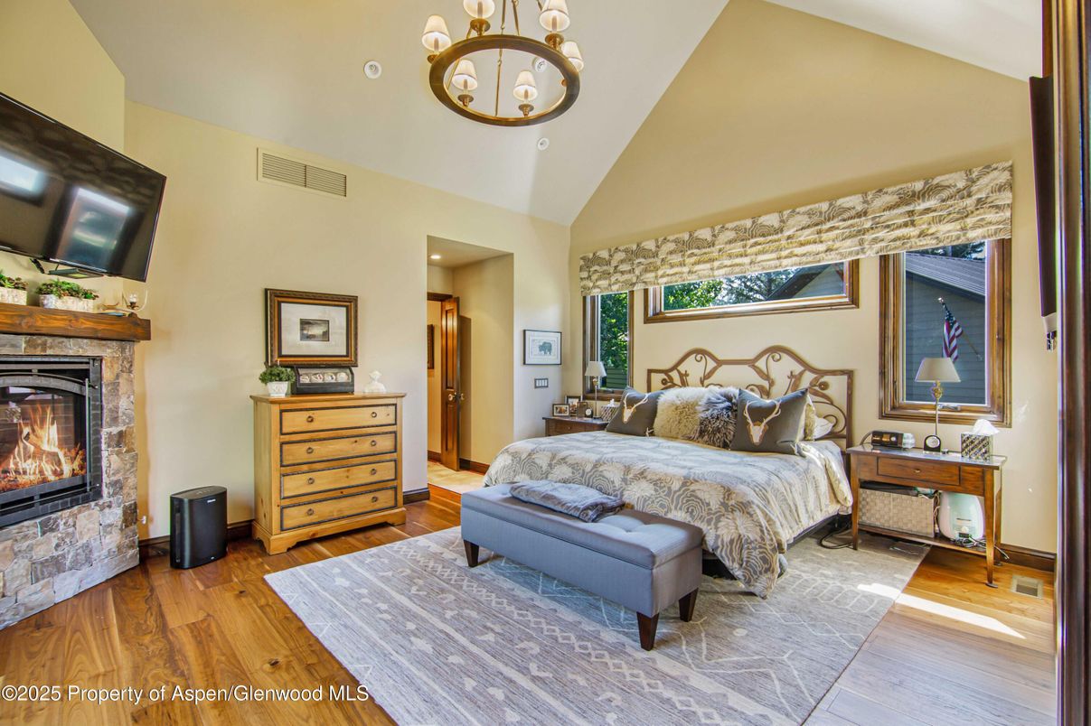 Bedroom, Fireplace, Interior, Pendant Lights, Recessed Lighting, Wood Texture Flooring