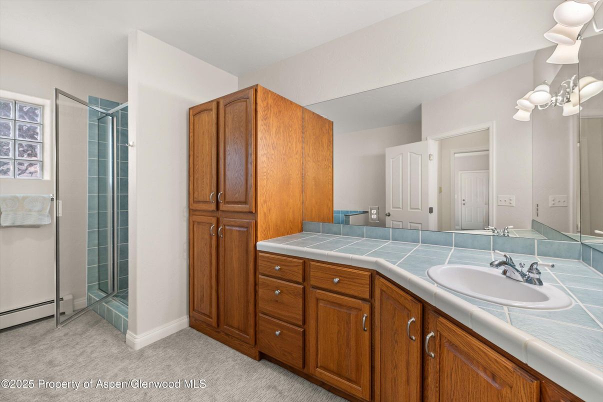 Bathroom, Dual Sink Vanities, Glass Shower, Interior, Tile Countertops