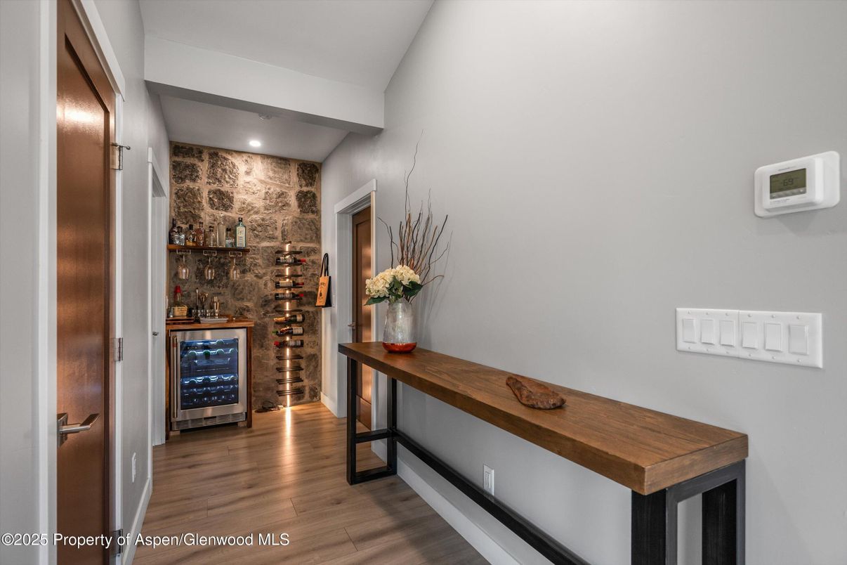 Interior, Recessed Lighting, Stone Walls, Wine Storage, Wood Texture Flooring