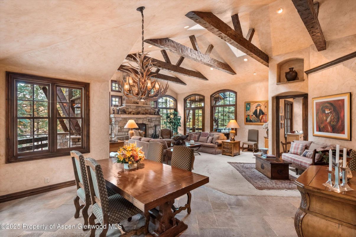 Chandelier, Dining room, Fireplace, Interior, Living room, Pendant Lights, Recessed Lighting, Wooden Beams