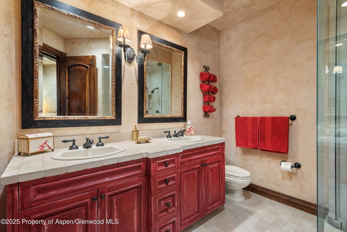 Bathroom, Dual Sink Vanities, Glass Shower, Interior, Recessed Lighting, Tile Countertops