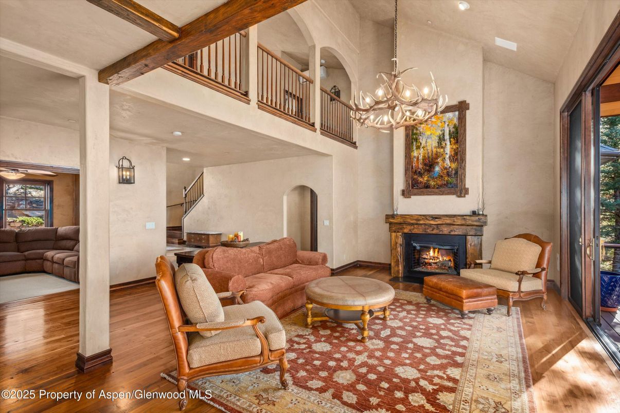 Chandelier, Fireplace, Interior, Living room, Recessed Lighting, Wooden Beams, Wood Texture Flooring