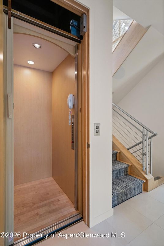 Elevator, Interior, Recessed Lighting, Wood Texture Flooring, Wooden Walls