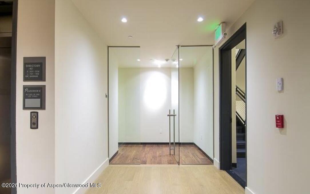 Elevator, Interior, Recessed Lighting, Wood Texture Flooring