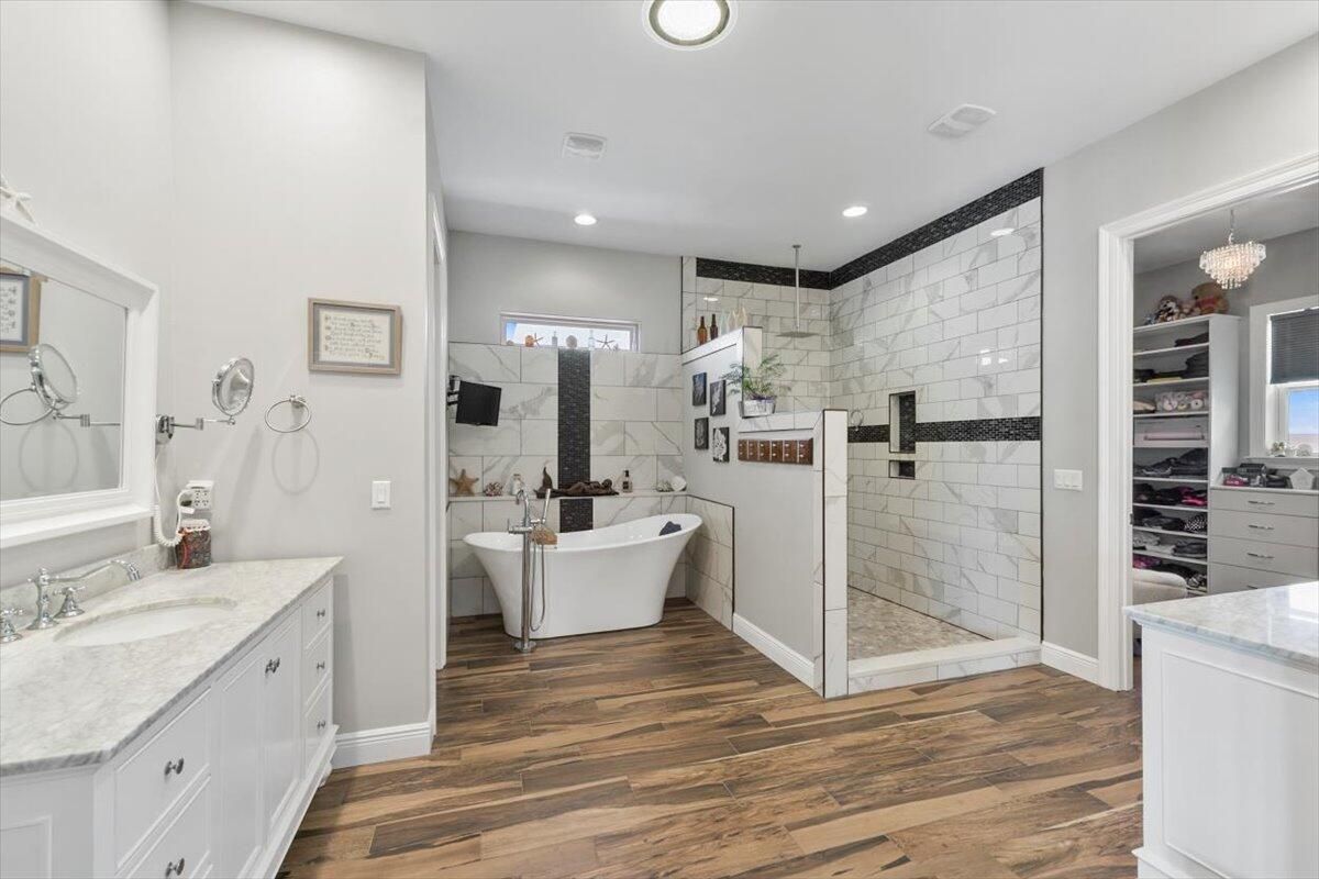 Bathroom, Dual Sink Vanities, Free Standing Baths, Interior, Recessed Lighting, Wood Texture Flooring