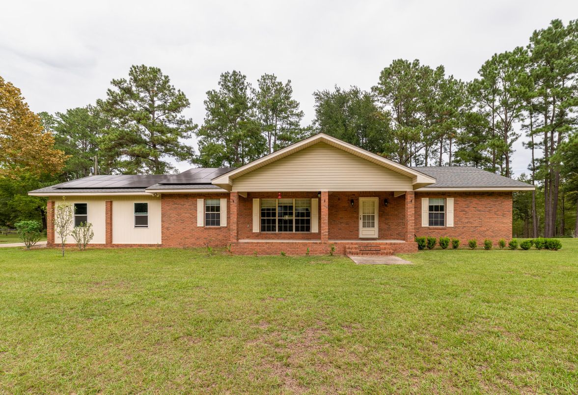 Backyard, Exterior, Facade, Brick Facade, Solar Panels, Ranch