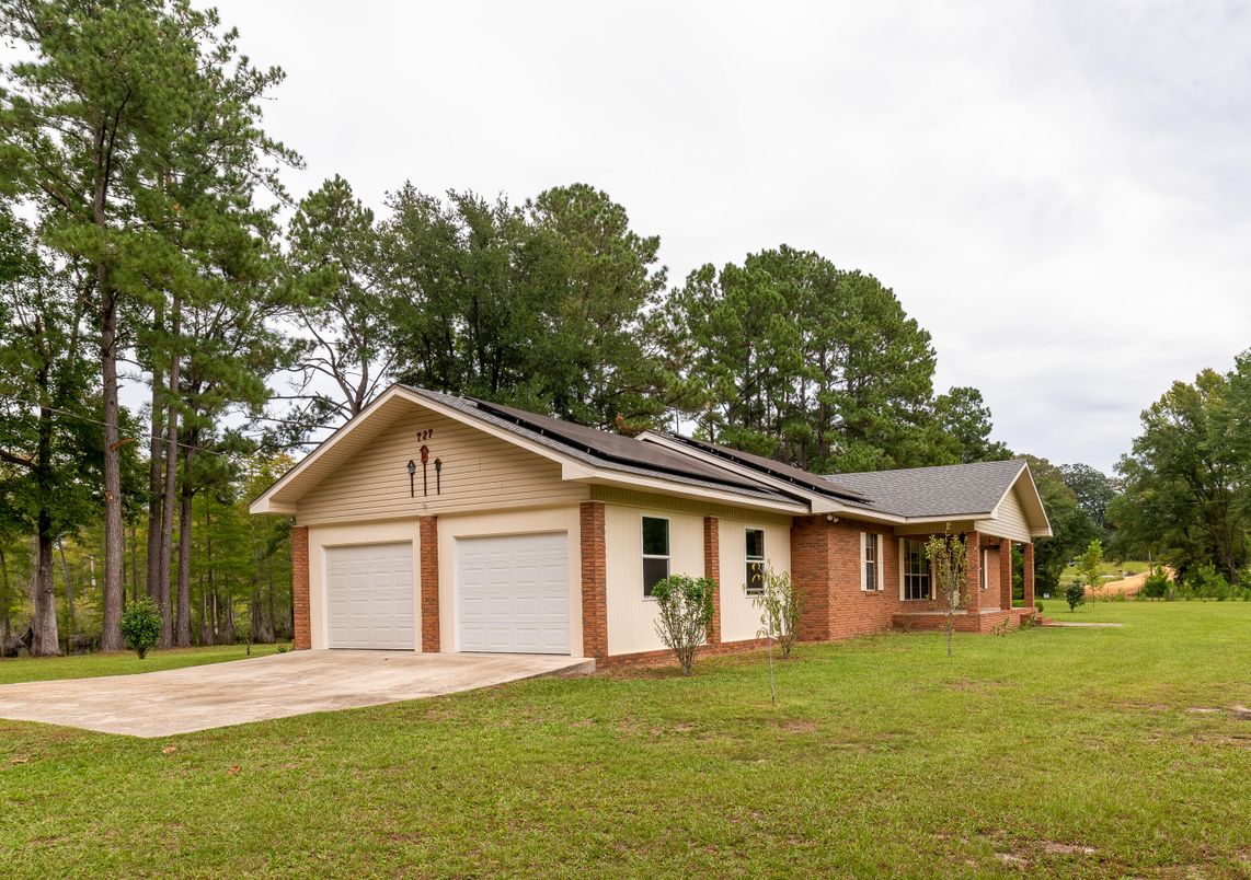 Attached, Exterior, Facade, Brick Facade, Solar Panels, Ranch