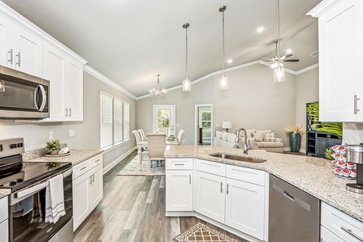 Chandelier, Dining room, Interior, Kitchen, Pendant Lights, Recessed Lighting, Stainless Steel Appliances, Wood Texture Flooring