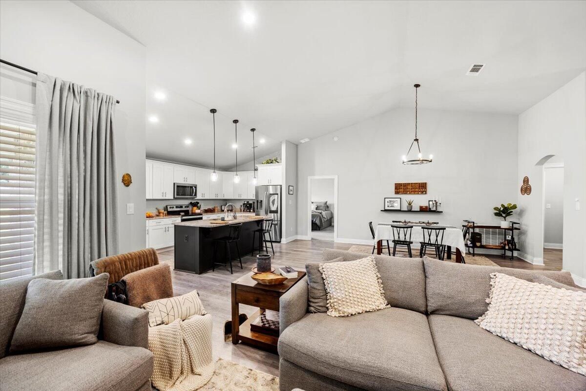 Dining room, Interior, Kitchen, Living room, Pendant Lights, Recessed Lighting, Stainless Steel Appliances, Wood Texture Flooring