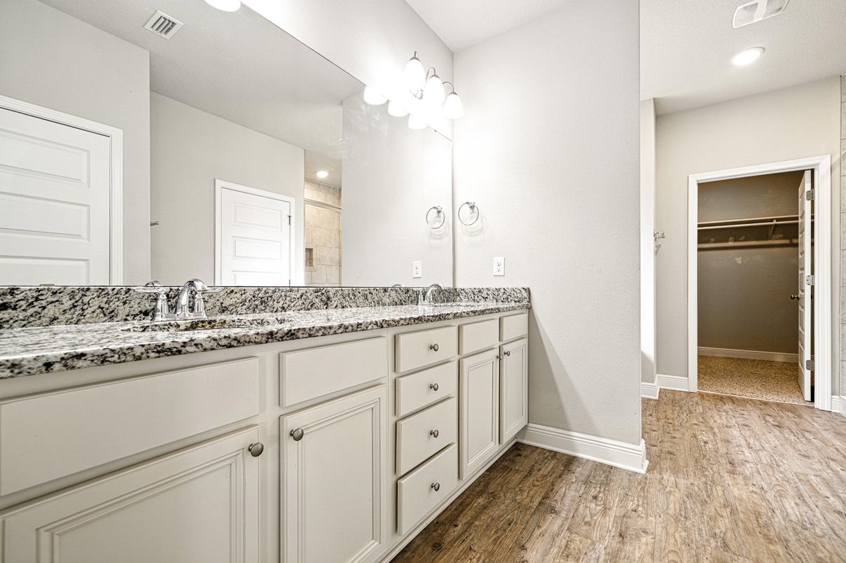 Bathroom, Dual Sink Vanities, Interior, Recessed Lighting, Walk-in Closets, Wood Texture Flooring