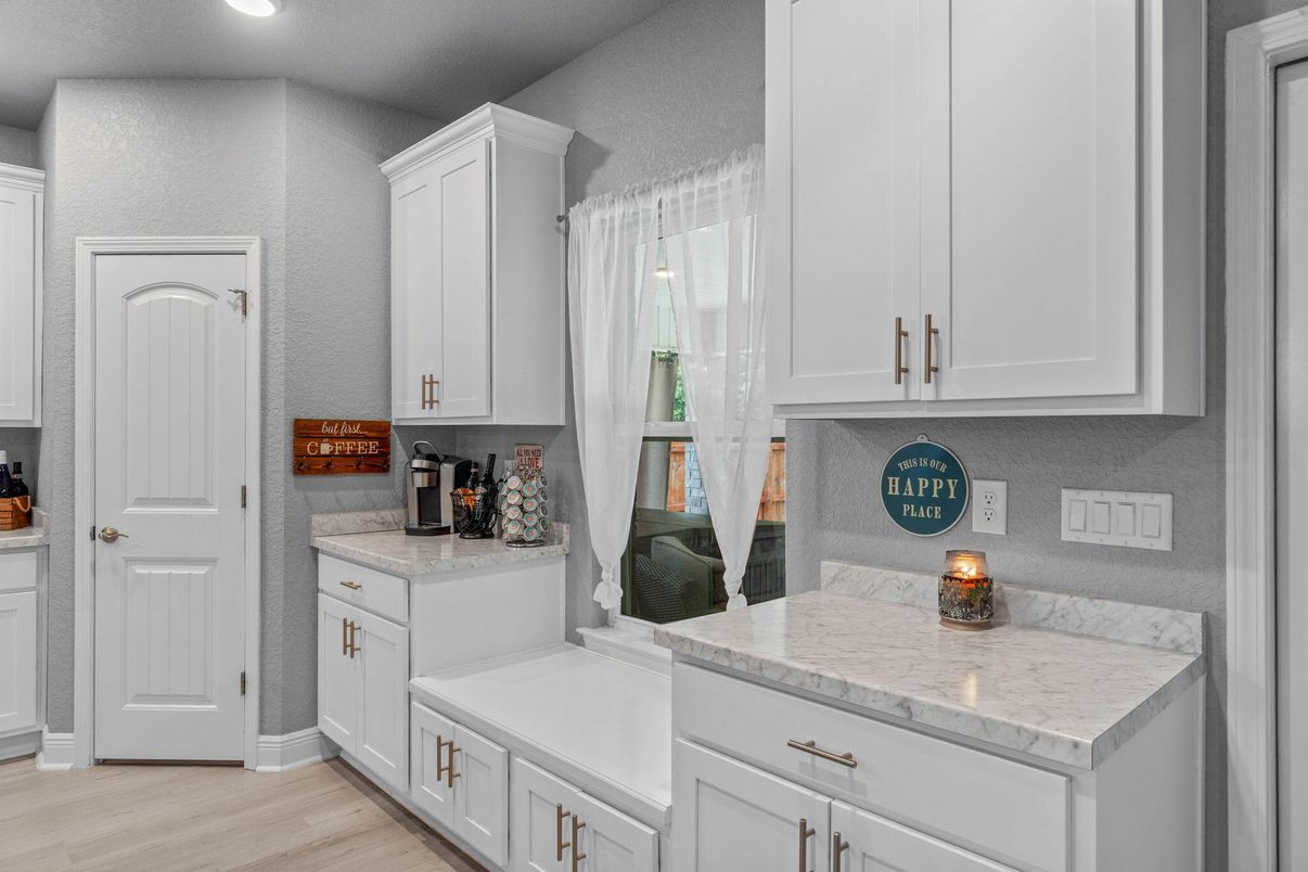 Interior, Kitchen, Recessed Lighting, Tile Countertops, Wood Texture Flooring