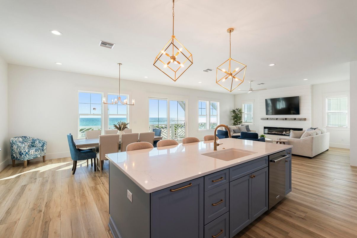 Dining room, Fireplace, Interior, Kitchen, Living room, Pendant Lights, Recessed Lighting, Water, Wood Texture Flooring