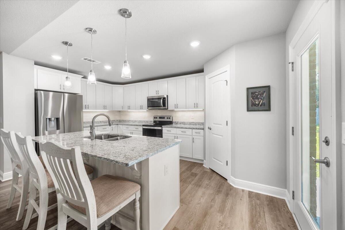 Interior, Kitchen, Pendant Lights, Recessed Lighting, Stainless Steel Appliances, Wood Texture Flooring