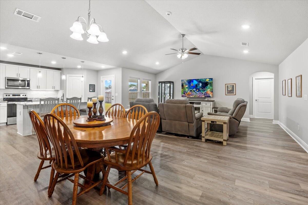 Chandelier, Dining room, Interior, Kitchen, Living room, Pendant Lights, Recessed Lighting, Wood Texture Flooring