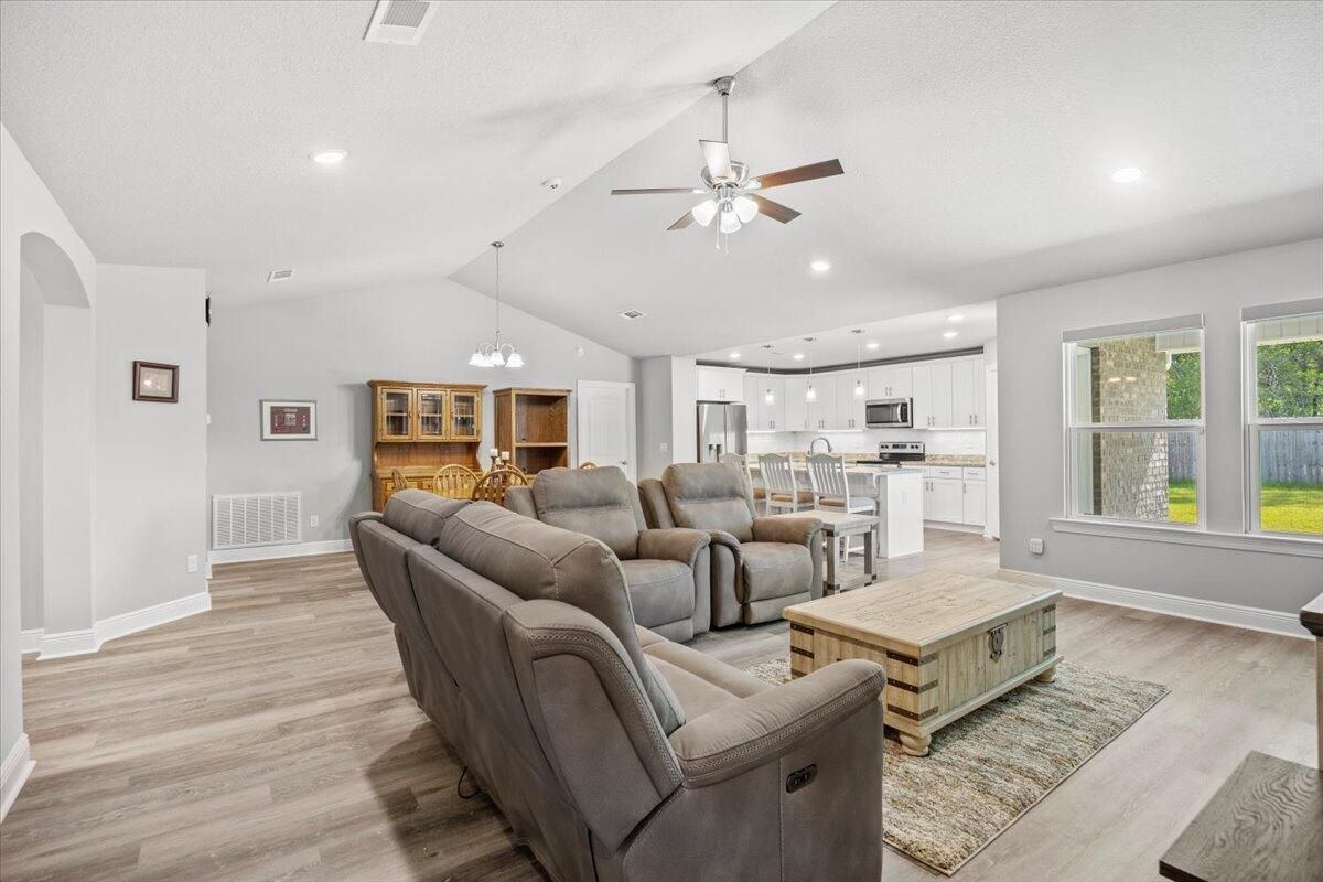 Chandelier, Dining room, Interior, Kitchen, Living room, Recessed Lighting, Stainless Steel Appliances, Wood Texture Flooring