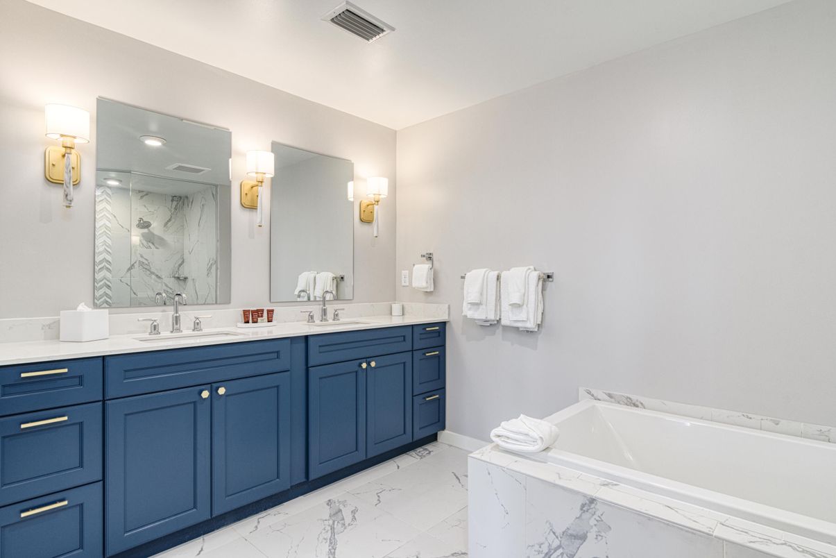 Bathroom, Dual Sink Vanities, Interior, Marble, Marble Walls, Recessed Lighting