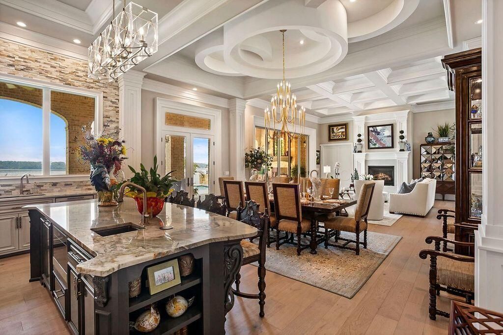 Chandelier, Dining room, Fireplace, Interior, Kitchen, Living room, Recessed Lighting, Water, Wood Texture Flooring