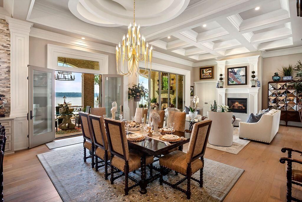 Chandelier, Dining room, Fireplace, Interior, Living room, Recessed Lighting, Water, Wood Texture Flooring