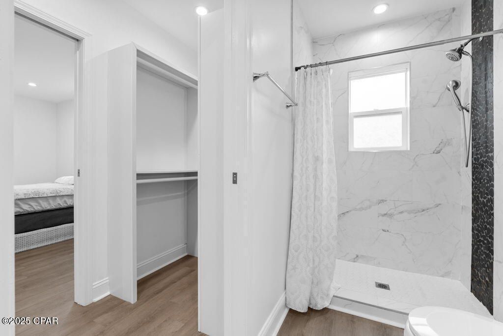Bathroom, Interior, Marble Walls, Recessed Lighting, Wood Texture Flooring