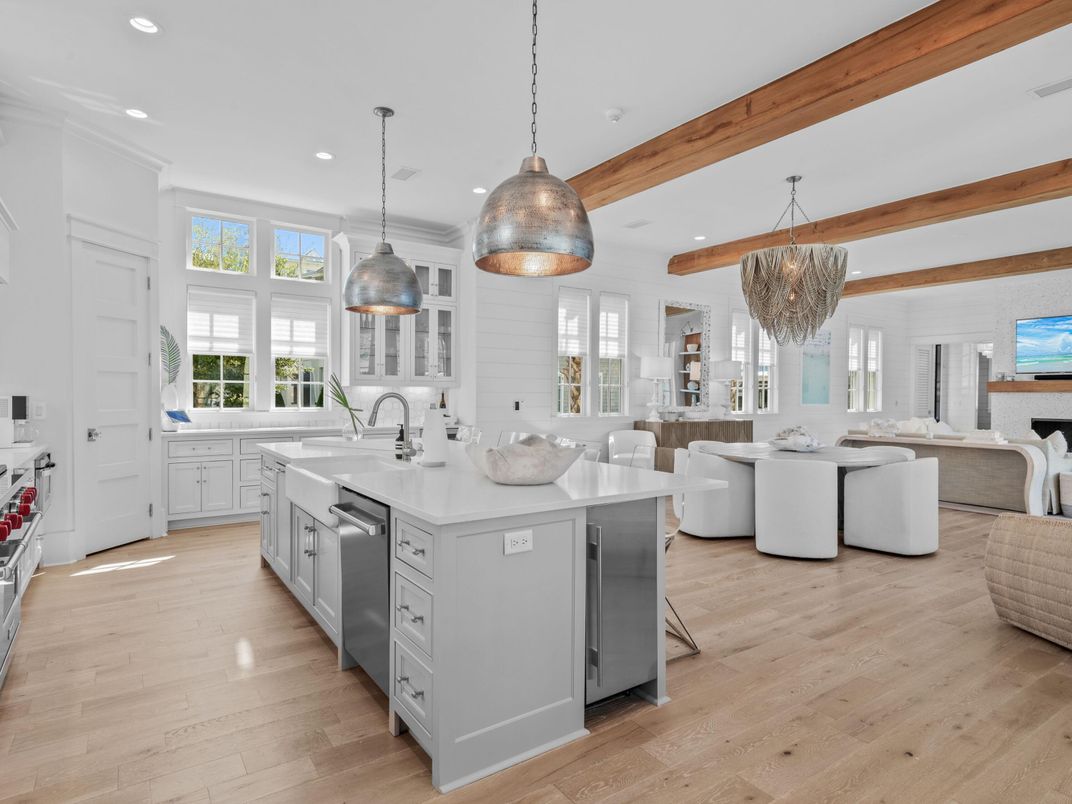 Chandelier, Dining room, Interior, Kitchen, Pendant Lights, Recessed Lighting, Stainless Steel Appliances, Wooden Beams, Wood Texture Flooring