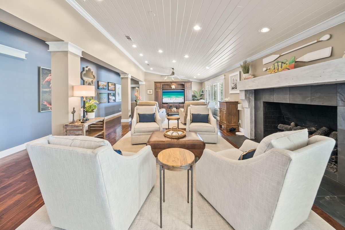 Dining room, Fireplace, Interior, Living room, Pendant Lights, Recessed Lighting, Wood Texture Flooring
