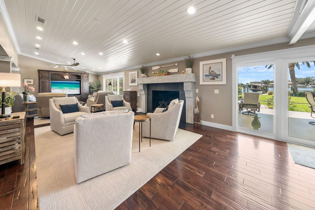 Fireplace, Interior, Living room, Recessed Lighting, Water, Wood Texture Flooring