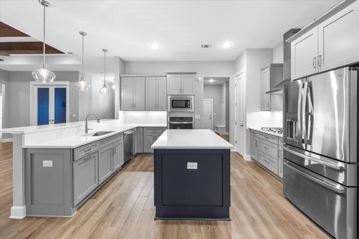 Interior, Kitchen, Pendant Lights, Recessed Lighting, Stainless Steel Appliances, Wood Texture Flooring